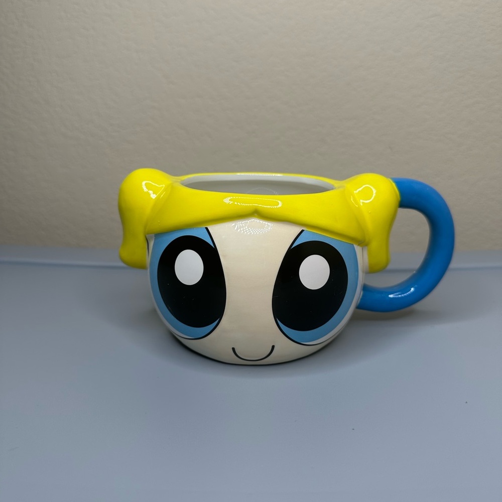 New! Cartoon Character Mug with Yellow and Blue Accents